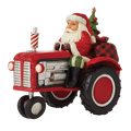 Santa Driving Tractor Figurine